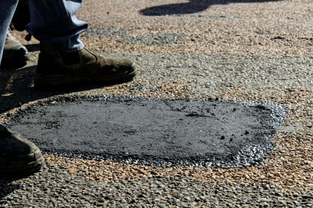 The Importance of Addressing Potholes in Your Parking Lot Business